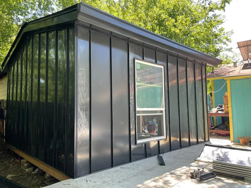 Black standing seam metal wall panels for Roof Inspection in Crouch Mesa