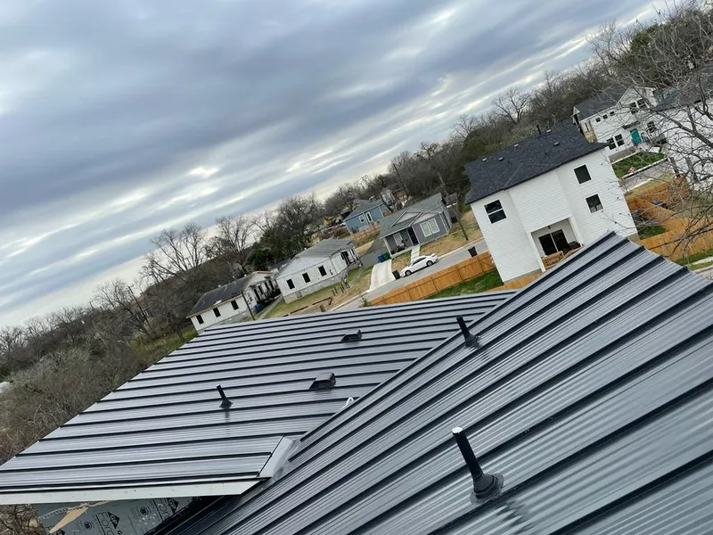 Standing seam metal roof panels with vents for Skylight Repair in Crouch Mesa